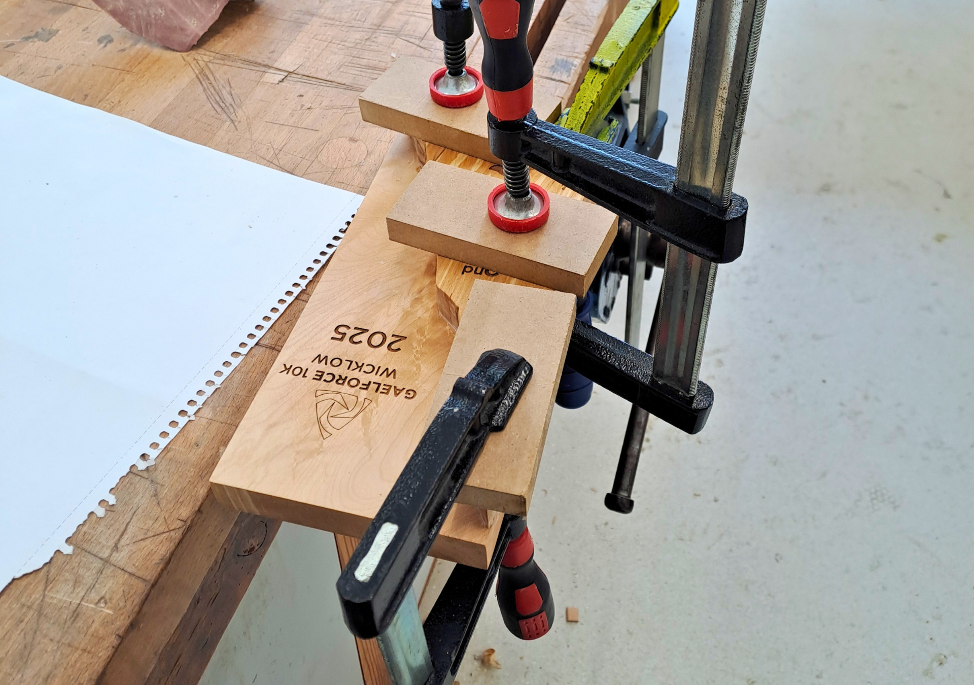 Gaelforce trophy timber clamped in the workshop during production